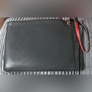 Christian Louboutin wristlet